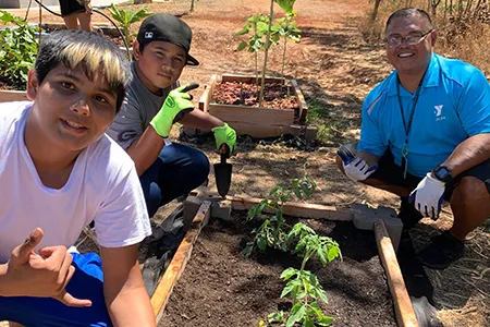 teens gardening at the ymca